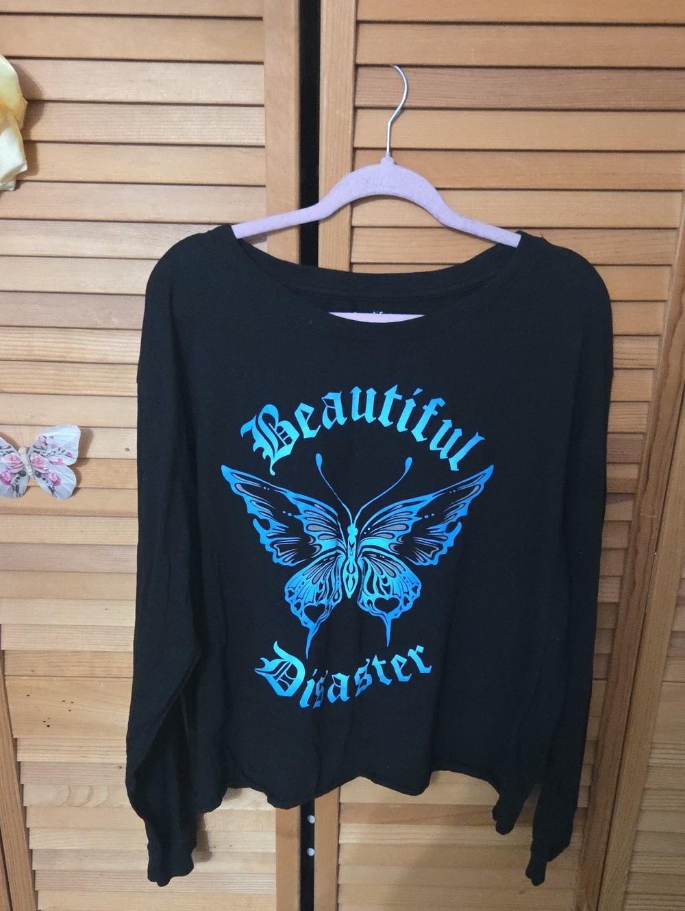 Beautiful Disaster Black Long-Sleeve Graphic Crop Tee with Blue Butterfly Print